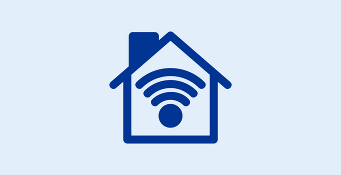 Dark blue outline of house with wifi symbol on light blue background